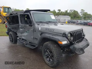 2022 Jeep Wrangler Unlimited Sport with VIN 1C4HJXDN9NW241154, listed as a IAAI auction lot 40211944 with 31,344 mi miles and . Bid and sale history available at DreamBid. Image 1.