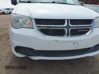 2017 Dodge Grand Caravan SE z VIN 2C4RDGBG4HR666987, wystawiony jako IAAI lot #41946734 z przebiegiem 239 683 mil mil oraz . Historia ofert i sprzedaży dostępna na DreamBid. Obrazek 6.