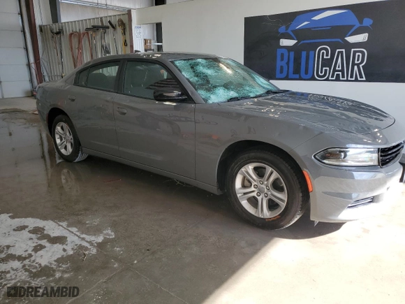 2023 Dodge Charger SXT with VIN 2C3CDXBG2PH587879, listed as a Copart auction lot 54262165 with 60,663 mi miles and Salvage Title. Bid and sale history available at carsss.com. Image 4.