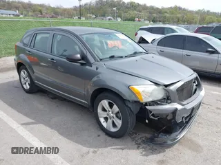 2012 Dodge Caliber SXT with VIN 1C3CDWDA6CD506019, listed as a IAAI auction lot 41999560 with 146,446 mi miles and . Bid and sale history available at DreamBid. Image 1.