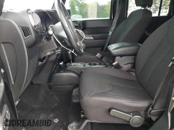 2018 Jeep Wrangler JK Unlimited Sport S with VIN 1C4BJWDG2JL859963, listed as a Copart auction lot 51613135 with 63,746 mi miles and Salvage Title. Bid and sale history available at carsss.com. Image 7.