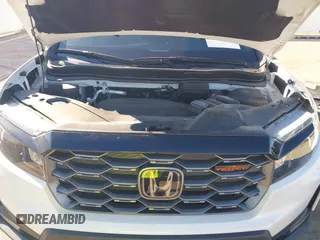 2023 Honda Passport TrailSport z VIN 5FNYF8H68PB007654, wystawiony jako IAAI lot #40816118 z przebiegiem 35 656 mil mil oraz . Historia ofert i sprzedaży dostępna na DreamBid. Obrazek 10.