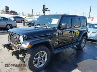 2020 Jeep Wrangler Unlimited Sahara with VIN 1C4HJXEN7LW230214, listed as a IAAI auction lot 41812466 with 59,004 mi miles. Bid and sale history available at carsss.com. Image 18.