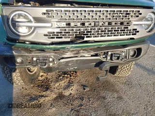 2023 Ford Bronco z VIN 1FMEE5DP2PLB43810, wystawiony jako IAAI lot #41656885 z przebiegiem 22 178 mil mil oraz . Historia ofert i sprzedaży dostępna na DreamBid. Obrazek 6.