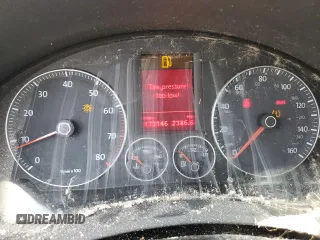 2008 Volkswagen Rabbit S with VIN WVWAA71KX8W157456, listed as a Copart auction lot 56331275 with 173,146 mi miles and Salvage title. Bid and sale history available at DreamBid. Image 9.