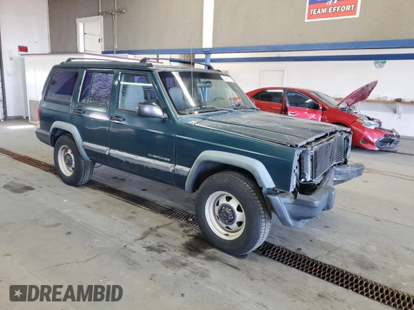 1997 Jeep Cherokee SE with VIN 1J4FJ28S0VL551442, listed as a Copart auction lot 49215195 with 164,356 mi miles and Salvage Title. Bid and sale history available at carsss.com. Image 4.