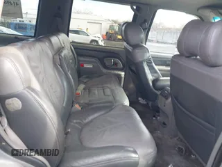 1999 GMC Denali z VIN 1GKEK13R7XR903255, wystawiony jako IAAI lot #41496032 z przebiegiem 233 645 mil mil oraz . Historia ofert i sprzedaży dostępna na DreamBid. Obrazek 8.