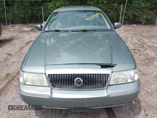 2005 Mercury Grand Marquis LS Premium z VIN 2MHHM75W95X607697, wystawiony jako IAAI lot #42453303 z przebiegiem 142 879 mil mil oraz . Historia ofert i sprzedaży dostępna na DreamBid. Obrazek 6.