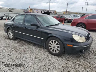2002 Hyundai Sonata GLS with VIN KMHWF35H52A615774, listed as a Copart auction lot 72336474 with 156,588 mi miles and Salvage Title. Bid and sale history available at carsss.com. Image 4.