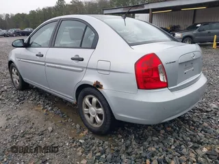 2006 Hyundai Accent GLS with VIN KMHCN46C46U035208, listed as a IAAI auction lot 41769016 with 141,065 mi miles. Bid and sale history available at carsss.com. Image 3.