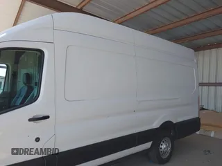 2022 Ford Transit Cargo with VIN 1FTBW3X89NKA69141, listed as a IAAI auction lot 41980864 with 102,721 mi miles and . Bid and sale history available at DreamBid. Image 14.
