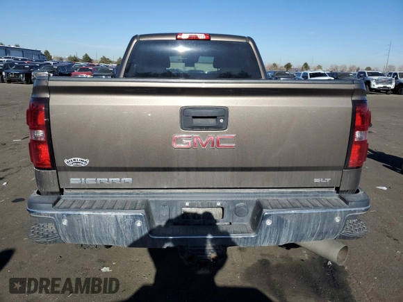 2015 GMC Sierra 3500HD SLT z VIN 1GT423E88FF189157, wystawiony jako Copart lot #84967694 z przebiegiem 137 147 mil mil oraz Czysty tytuł • Clean title. Historia ofert i sprzedaży dostępna na DreamBid. Obrazek 6.