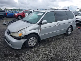 2003 Honda Odyssey EX-L z VIN 5FNRL18033B042810, wystawiony jako IAAI lot #42229495 z przebiegiem 231 682 mil mil oraz . Historia ofert i sprzedaży dostępna na DreamBid. Obrazek 2.