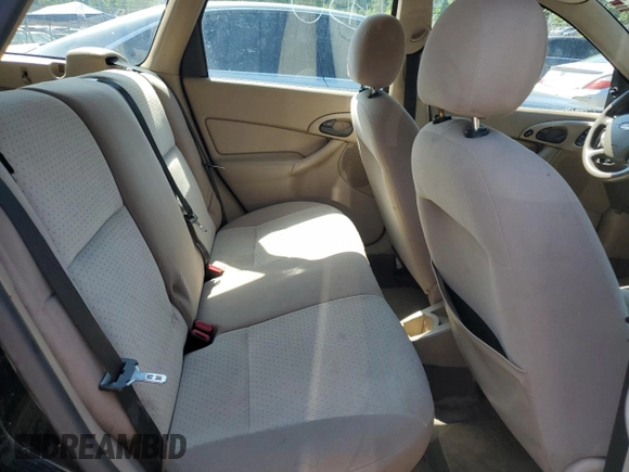 2004 Ford Focus ZTW with VIN 1FAFP35Z84W203676, listed as a Copart auction lot 57272835 with 183,115 mi miles and Salvage title. Bid and sale history available at DreamBid. Image 10.
