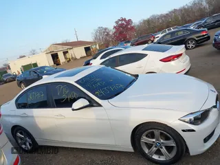 2014 BMW 3 Series 328i xDrive with VIN WBA3B5C52EF958635, listed as a IAAI auction lot 40916777 with 143,975 mi miles. Bid and sale history available at carsss.com. Image 12.