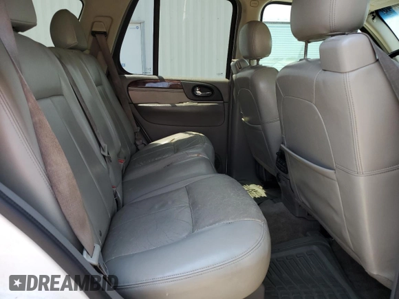 2006 GMC Envoy SLE z VIN 1GKDT13S762345183, wystawiony jako Copart lot #60096645 z przebiegiem 249 658 mil mil oraz Szkoda całkowita • Salvage title. Historia ofert i sprzedaży dostępna na DreamBid. Obrazek 11.