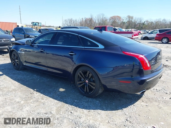 2014 Jaguar XJ Portfolio with VIN SAJWA2GZ4E8V60251, listed as a IAAI auction lot 41778702 with 45,180 mi miles and . Bid and sale history available at DreamBid. Image 3.