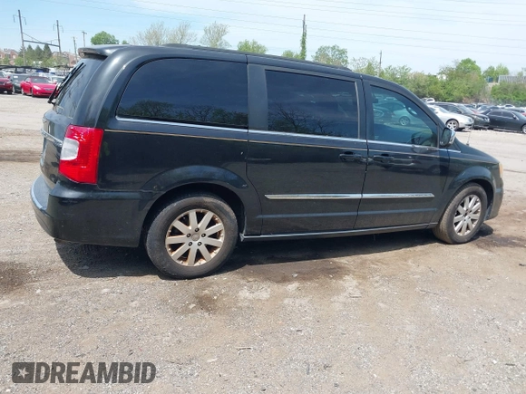 2011 Chrysler Town & Country Touring L with VIN 2A4RR8DGXBR614723, listed as a IAAI auction lot 42156531 with 116,759 mi miles and . Bid and sale history available at DreamBid. Image 4.