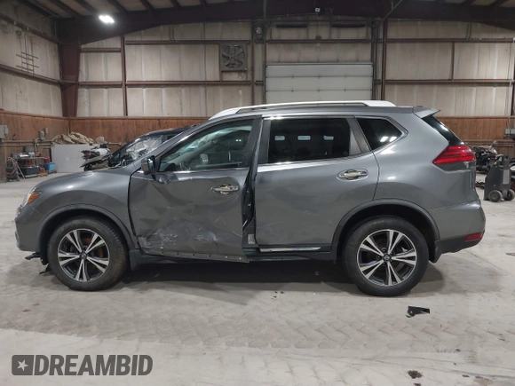 2017 Nissan Rogue S with VIN JN8AT2MV6HW275480, listed as a IAAI auction lot 41731679 with 143,932 mi miles and . Bid and sale history available at DreamBid. Image 14.