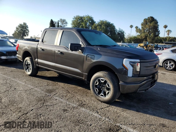 2023 Ford F-150 Lightning Pro with VIN 1FTVW1EL7PWG11261, listed as a Copart auction lot 64088925 with 3,288 mi miles and Salvage title. Bid and sale history available at DreamBid. Image 4.