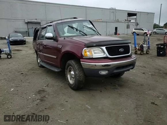 1999 Ford Expedition XLT with VIN 1FMPU18L6XLA61106, listed as a Copart auction lot 62688735 with 105,551 mi miles and Salvage title. Bid and sale history available at DreamBid. Image 14.
