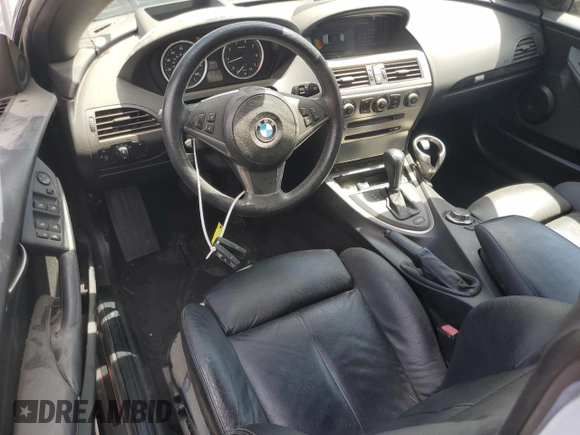 2007 BMW 6 Series 650i z VIN WBAEK13577CN81886, wystawiony jako Copart lot #51362585 z przebiegiem 110 174 mil mil oraz Czysty tytuł • Clean title. Historia ofert i sprzedaży dostępna na DreamBid. Obrazek 8.