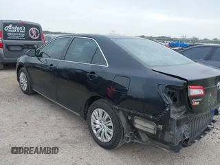 2014 Toyota Camry L with VIN 4T4BF1FK2ER390414, listed as a IAAI auction lot 41936368 with 164,811 mi miles and . Bid and sale history available at DreamBid. Image 3.