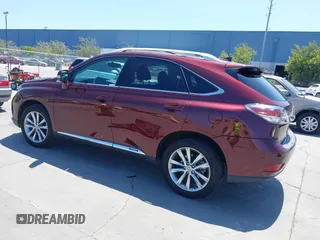 2015 Lexus RX 450h with VIN 2T2BC1BA8FC010233, listed as a IAAI auction lot 42526080 with 61,227 mi miles and . Bid and sale history available at DreamBid. Image 3.