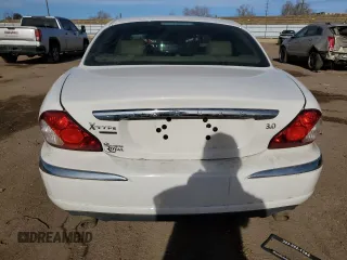 2007 Jaguar X-Type z VIN SAJWA51A07WJ14424, wystawiony jako Copart lot #84556864 z przebiegiem Nie podano mil oraz Szkody całkowita. Historia ofert i sprzedaży dostępna na DreamBid. Obrazek 6.