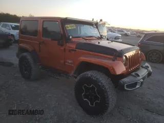 2011 Jeep Wrangler Sahara with VIN 1J4GA5D11BL627667, listed as a Copart auction lot 87227054 with 124,009 mi miles and Clean Title. Bid and sale history available at DreamBid. Image 4.