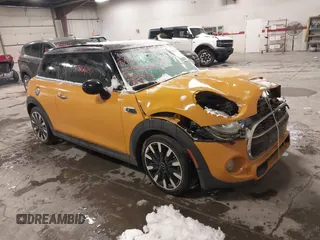 2016 MINI Hardtop S with VIN WMWXP7C51G2C61145, listed as a IAAI auction lot 40966675 with 70,077 mi miles and . Bid and sale history available at DreamBid. Image 1.