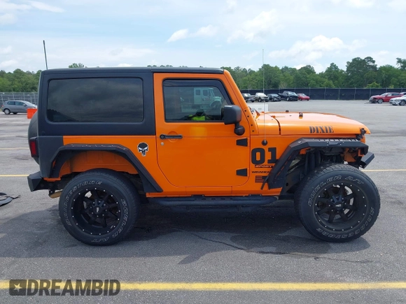 2013 Jeep Wrangler Sport z VIN 1C4AJWAG2DL538526, wystawiony jako IAAI lot #42378501 z przebiegiem 81 709 mil mil oraz . Historia ofert i sprzedaży dostępna na DreamBid. Obrazek 14.