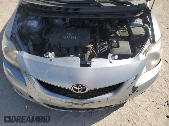 2009 Toyota Yaris with VIN JTDBT903591302633, listed as a Copart auction lot 53512185 with 351,622 mi miles and Salvage Title. Bid and sale history available at carsss.com. Image 11.