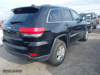 2014 Jeep Grand Cherokee Laredo with VIN 1C4RJFAG9EC516138, listed as a IAAI auction lot 42055214 with 135,701 mi miles. Bid and sale history available at carsss.com. Image 4.