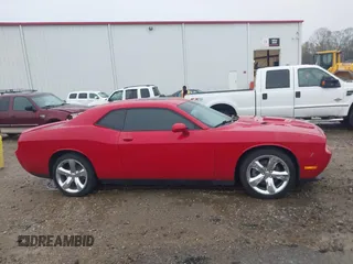2013 Dodge Challenger R/T with VIN 2C3CDYBT5DH588006, listed as a IAAI auction lot 41858679 with 160,911 mi miles. Bid and sale history available at carsss.com. Image 13.