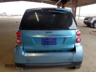 2009 Smart fortwo Pure with VIN WMEEJ31XX9K264071, listed as a Copart auction lot 55315705 with 117,006 mi miles and Salvage Title. Bid and sale history available at carsss.com. Image 6.
