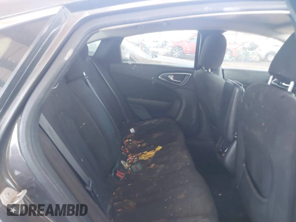 2015 Chrysler 200 Limited with VIN 1C3CCCAB0FN660612, listed as a IAAI auction lot 42015706 with 148,304 mi miles and . Bid and sale history available at DreamBid. Image 8.