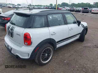 2014 MINI Countryman S z VIN WMWZC5C5XEWP37470, wystawiony jako IAAI lot #42396984 z przebiegiem 77 847 mil mil oraz . Historia ofert i sprzedaży dostępna na DreamBid. Obrazek 4.