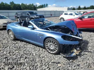 2006 Aston Martin DB9 z VIN SCFAB02A26GB04627, wystawiony jako Copart lot #68314504 z przebiegiem Nie podano mil oraz Szkody całkowita. Historia ofert i sprzedaży dostępna na DreamBid. Obrazek 4.