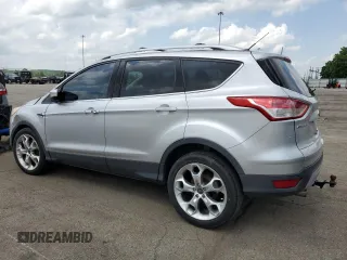 2013 Ford Escape Titanium с VIN 1FMCU9J92DUD31093, выставлен на аукционе Copart как лот 57121425 с пробегом 107 979 миль миль и Списание • Salvage title. История ставок и продаж доступна на DreamBid. Изображение 2.