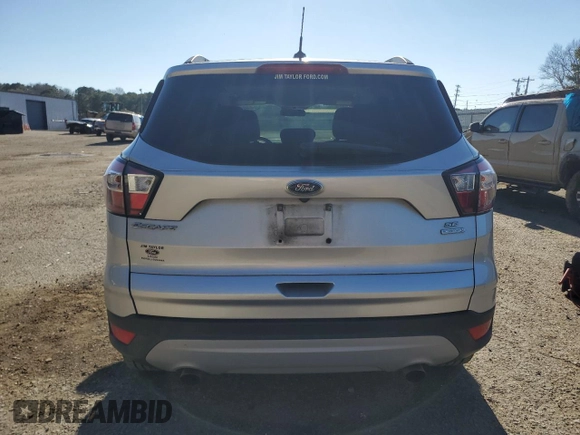 2018 Ford Escape SE with VIN 1FMCU0G90JUC13607, listed as a Copart auction lot 46534215 with 131,633 mi miles and Salvage Title. Bid and sale history available at carsss.com. Image 6.