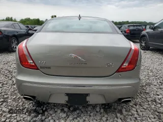 2014 Jaguar XJ z VIN SAJWJ1CD9E8V62338, wystawiony jako Copart lot #58924065 z przebiegiem 60 909 mil mil oraz Czysty tytuł • Clean title. Historia ofert i sprzedaży dostępna na DreamBid. Obrazek 6.