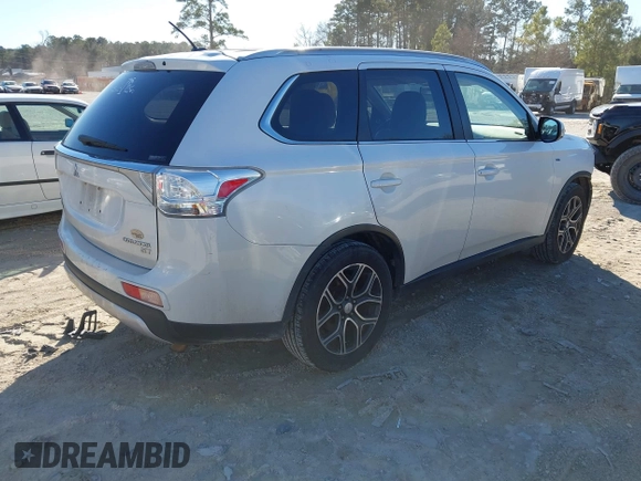 2015 Mitsubishi Outlander GT with VIN JA4JZ4AX4FZ013037, listed as a IAAI auction lot 41683425 with 172,700 mi miles and . Bid and sale history available at DreamBid. Image 4.