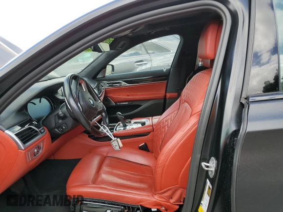 2017 BMW 7 Series with VIN WBA7F2C30HG423403, listed as a Copart auction lot 74029333 with 51,212 mi miles and . Bid and sale history available at DreamBid. Image 7.
