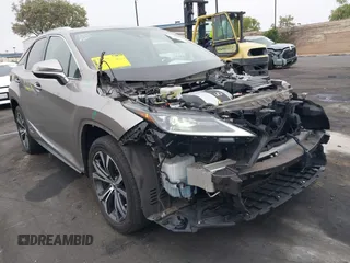2022 Lexus RX 450h z VIN 2T2HGMDA7NC072735, wystawiony jako IAAI lot #42356852 z przebiegiem 62 835 mil mil oraz . Historia ofert i sprzedaży dostępna na DreamBid. Obrazek 1.