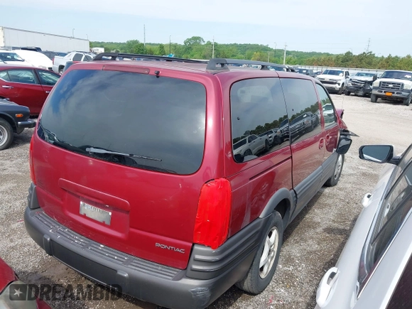 2004 Pontiac Montana 1SA with VIN 1GMDX03E94D111094, listed as a IAAI auction lot 41988723 with Not Provided miles and . Bid and sale history available at DreamBid. Image 4.