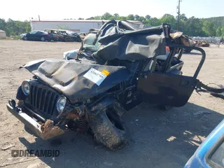 1999 Jeep Wrangler Sahara with VIN 1J4FY49S2XP466068, listed as a IAAI auction lot 42062789 with Not provided miles and . Bid and sale history available at DreamBid. Image 2.
