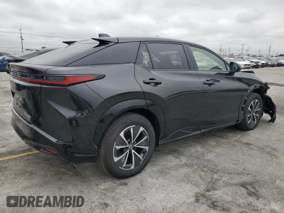2024 Lexus RZ 450e Premium z VIN JTJAAAABXRA026441, wystawiony jako Copart lot #56064095 z przebiegiem 422 mil mil oraz Szkody całkowita. Historia ofert i sprzedaży dostępna na DreamBid. Obrazek 3.