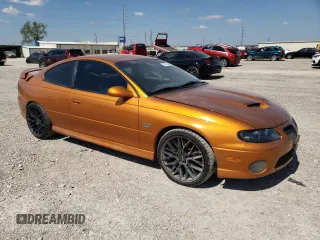 2006 Pontiac GTO with VIN 6G2VX12U76L521089, listed as a Copart auction lot 73374044 with 87,963 mi miles and Salvage Title. Bid and sale history available at carsss.com. Image 4.