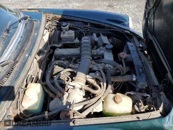 1983 Alfa Romeo Spider Veloce z VIN ZARBA541XD1016802, wystawiony jako Copart lot #51383595 z przebiegiem 127 904 mil mil oraz Czysty tytuł • Clean title. Historia ofert i sprzedaży dostępna na DreamBid. Obrazek 11.